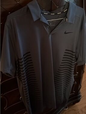 Nike Men's Dark Charcoal Gray Dri-FIT Polo with Subtle Stripe Accents XL